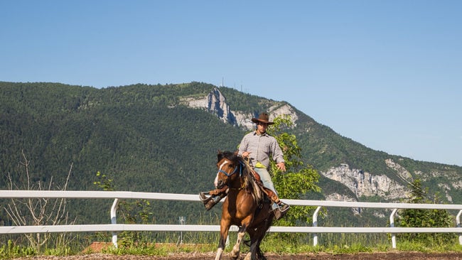 Horse riding through the mountains